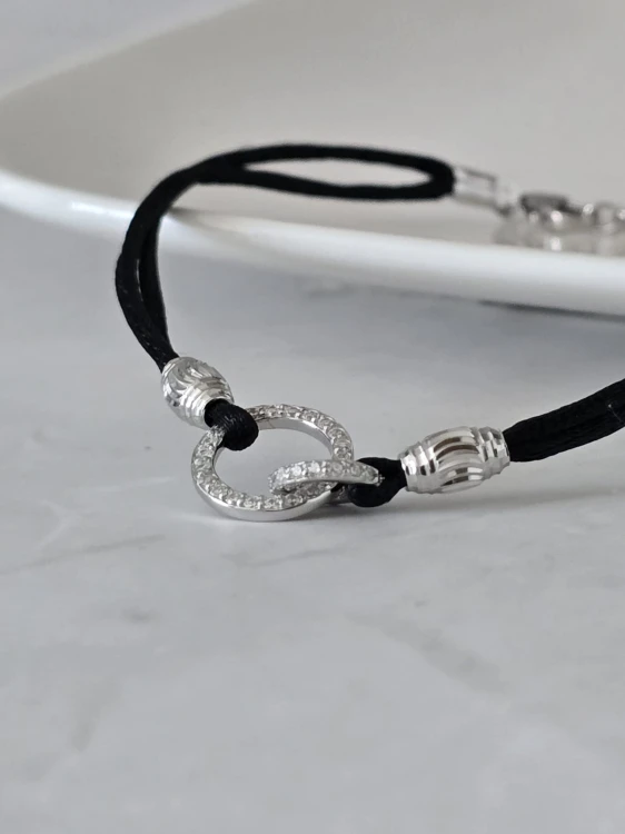 Bransoletka na sznurku z kółeczkami czarna