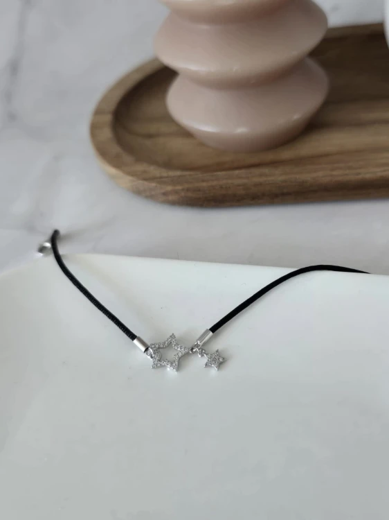 Bransoletka z gwiazdką na czarnym sznurku