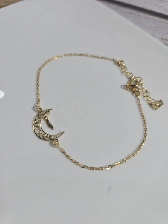 Bransoletka zlocona z księżycem i piórkiem