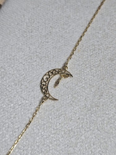 Bransoletka zlocona z księżycem i piórkiem