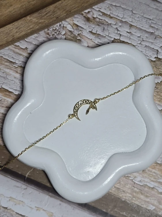 Bransoletka zlocona z księżycem i piórkiem